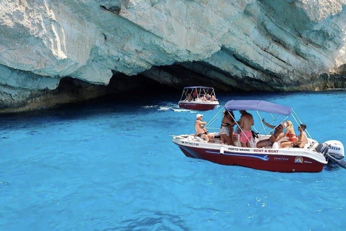 Photo stop at the Navagio Shipwreck and exploration of the Blue Caves